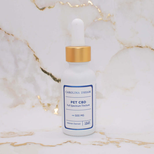 500mg Pet CBD Tincture from Carolina Dream in a white bottle with dropper, crafted for pet relaxation and comfort.